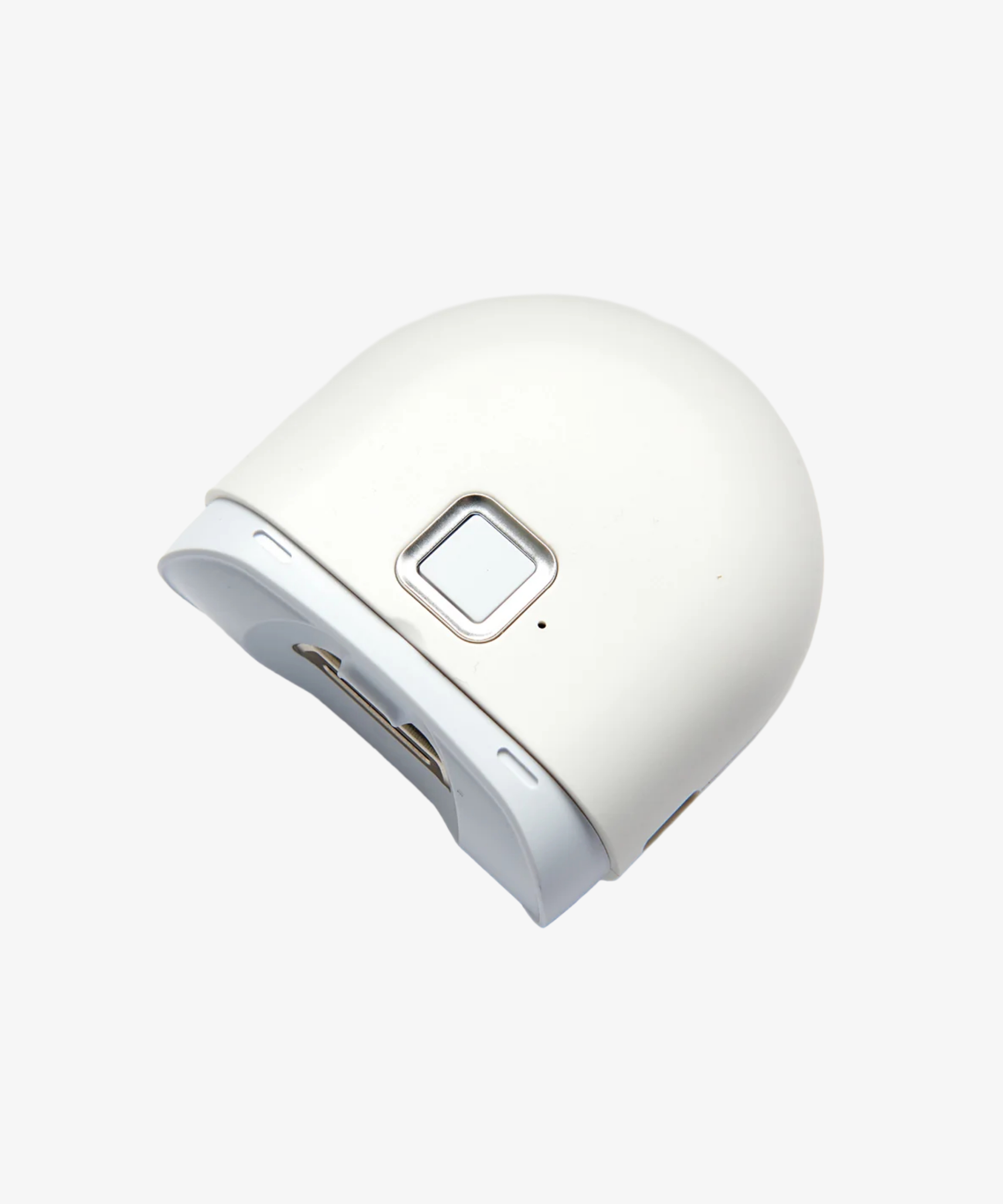 person using automatic nail trimmer close up